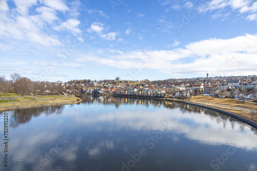 walking along nidelven (river) in a spring mood in trondheim city, trøndelag, nidelven, water, river, landscape, sky, nature, city, reflection, view, trees, clouds, travel, architecture, house, buildi © Gunnar E Nilsen