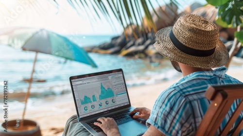 Remote worker using laptop on a tropical beach, blending business with a leisure environment
