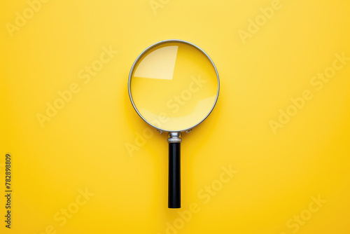 Sleek Magnifying Glass on a Vibrant Yellow Backdrop