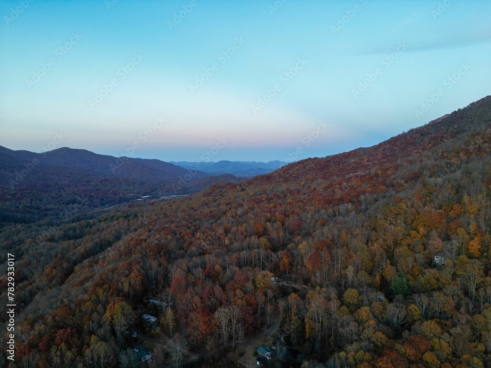 Aerial shot of colorful leaves of trees on a forest in North Carolina on autumn