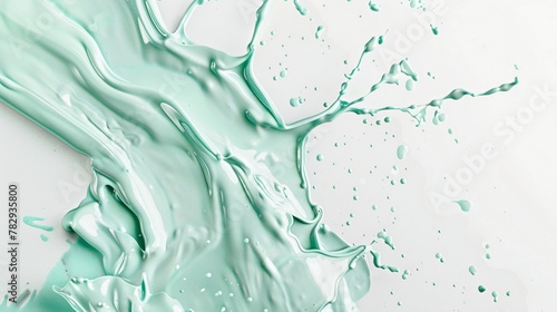 Mint paint splash on a pure white background photo