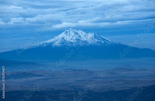Cloudy blue sky over Shasta California during blue hour © Wirestock