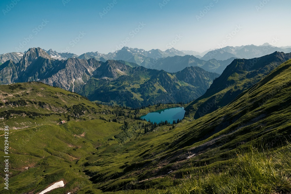 Aerial view of greenery mountain landscape with lake Aerial view of greenery mountain landscape with lake