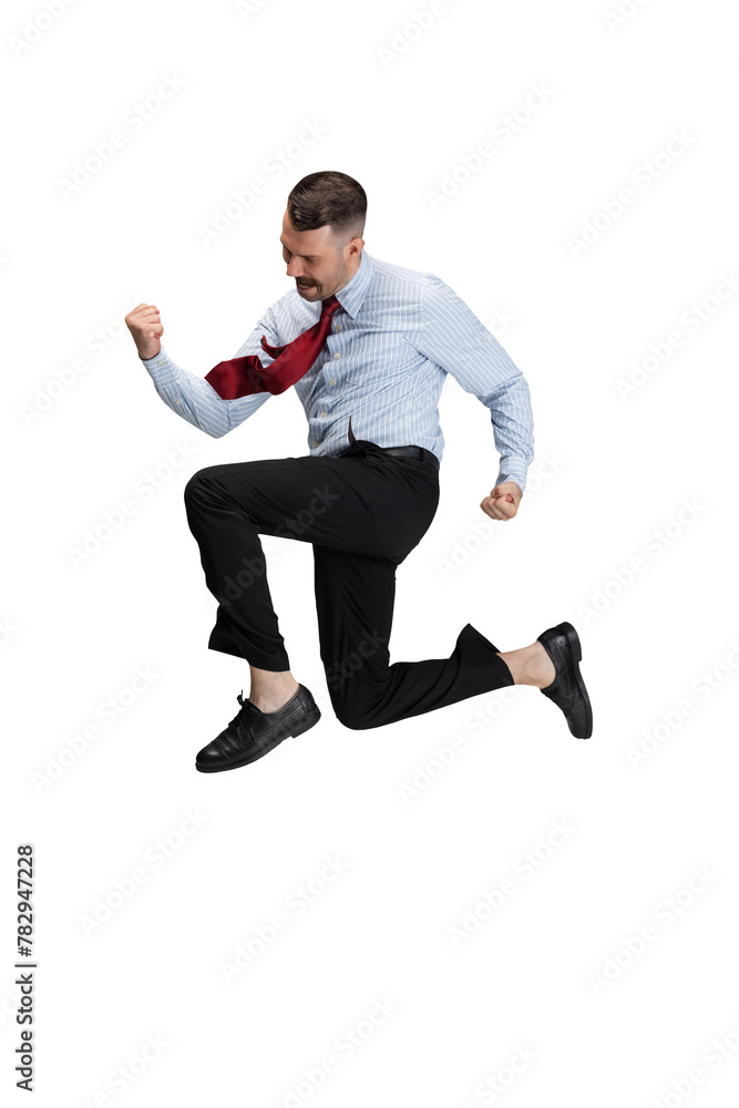 Young man, entrepreneur in office attire jumping of joy and happiness against transparent background. Concept of business, work, human emotions, facial expression, sales, ad. Young man, entrepreneur in office attire jumping of joy and happiness against transparent background. Concept of business, work, human emotions, facial expression, sales, ad.