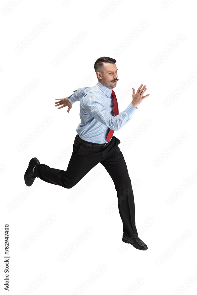 Motivated young man, entrepreneur fast running wearing in smart casual outfit against transparent background. Concept of business, work, human emotions, facial expression, sales, ad.