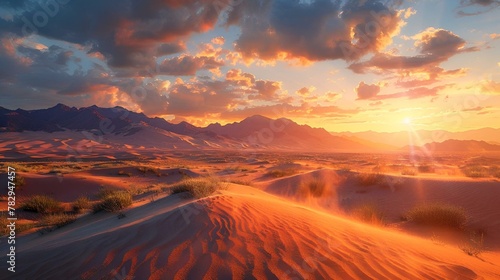 the sun setting over a vast desert with dunes in the foreground © Wirestock