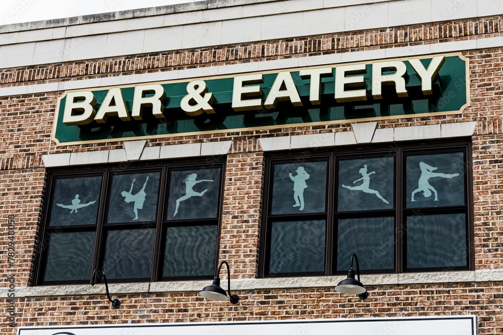 Bar and eatery sign on the building Bar and eatery sign on the building