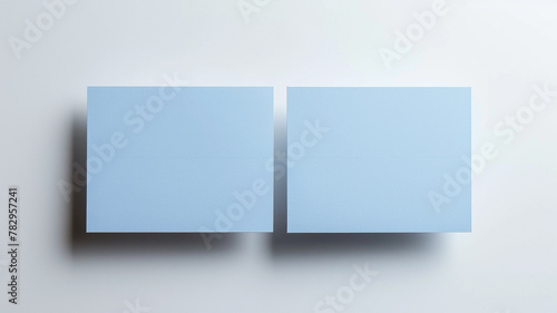 light blue blank business card mockup on white background