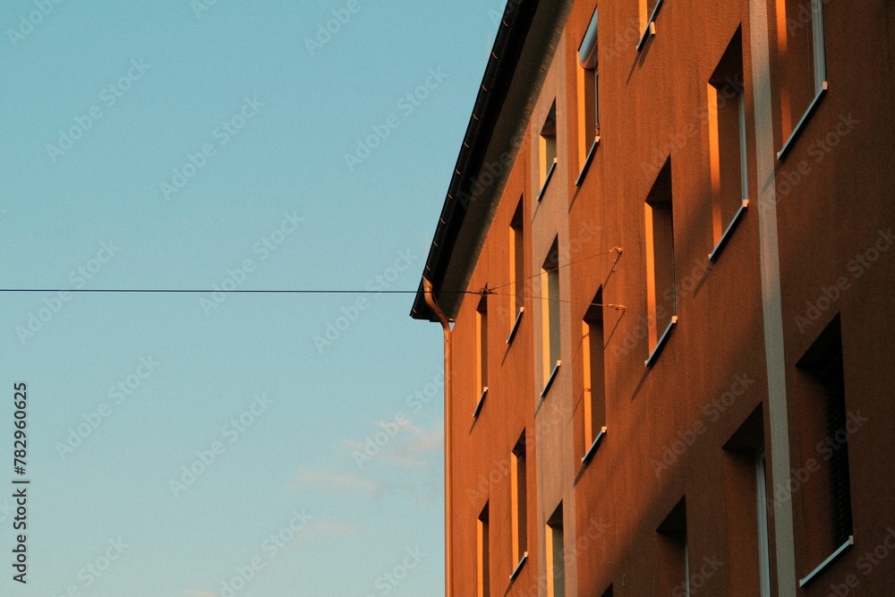 Fototapeta premium Exterior of building against a blue sky in Itzling, Salzburg