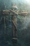 A wooden cross with a rope wrapped around it. Suitable for religious or historical themed projects