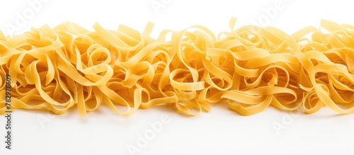 Pasta Noodles Piled on Whit...