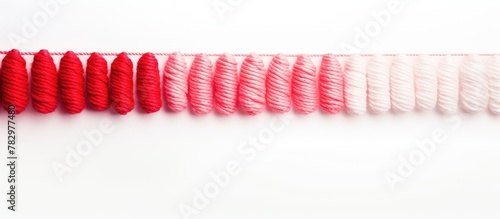 Red and white yarn thread o...