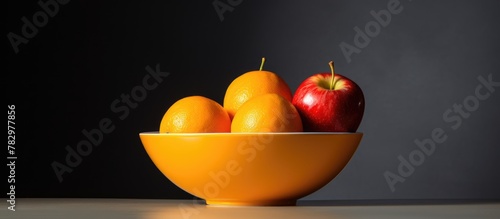 Bowl of apple and oranges