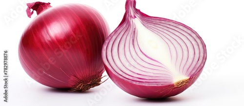 Red onion halved next to wh...
