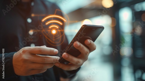 Businessperson utilizes smartphone, symbolizing business communication and social network concept, with wifi icon representing connectivity and networking.