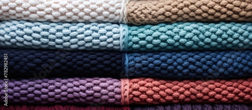 Stack of hand-knitted towel...