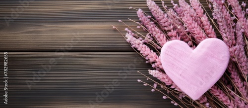 Pink heart flowers wood bac...