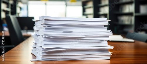 A stack of papers on a desk