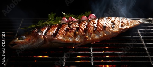 Fish grilling over flames