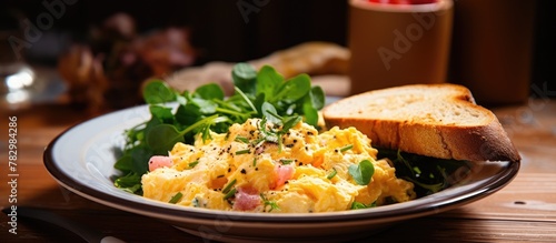 Scrambled eggs with salad a...