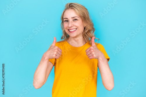 Happy woman showing thumb-up gesture, approve deal, recommend offer