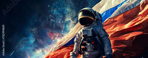 Russian cosmonaut on the background of the Russian flag photo