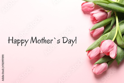 Fototapeta Naklejka Na Ścianę i Meble -  Happy Mother's Day greeting card. Beautiful tulip flowers on pink background