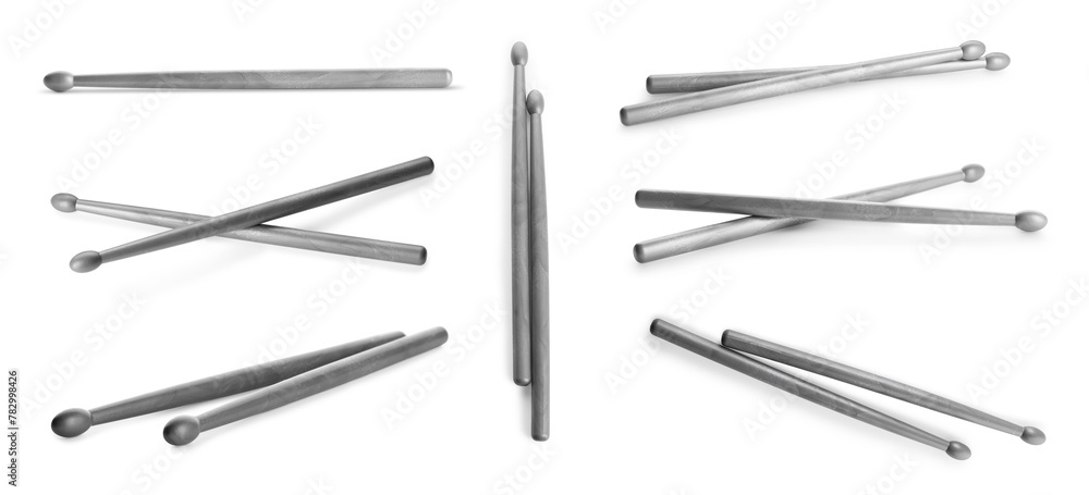 Plastic drum sticks isolated on white, set Plastic drum sticks isolated on white, set