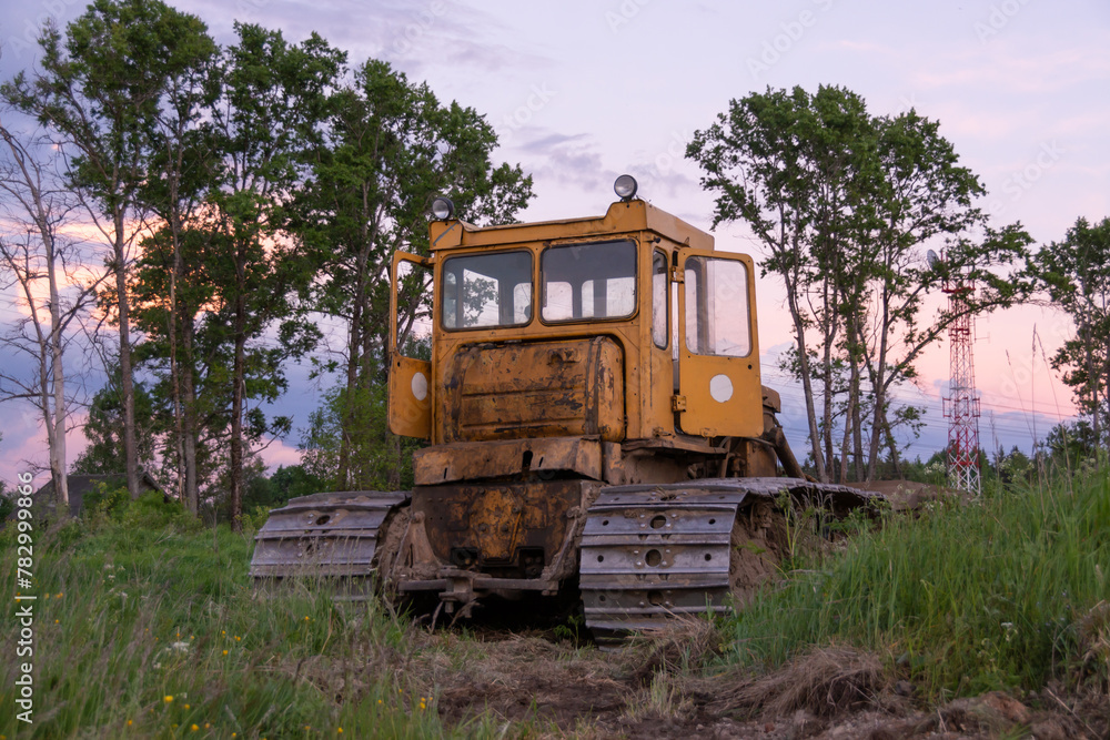 Tractor CHTZ-URALTRAK T-130. A bulldozer. A Soviet agricultural and industrial tracked tractor produced by the Chelyabinsk Tractor Plant. Tractor CHTZ-URALTRAK T-130. A bulldozer. A Soviet agricultural and industrial tracked tractor produced by the Chelyabinsk Tractor Plant.