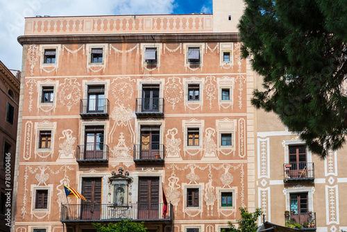 Barcelona, Spain: House facades at Placa del Pi, a charming square located in the Gothic Quarter (Barri Gotic), named after the Church of Santa Maria del Pi