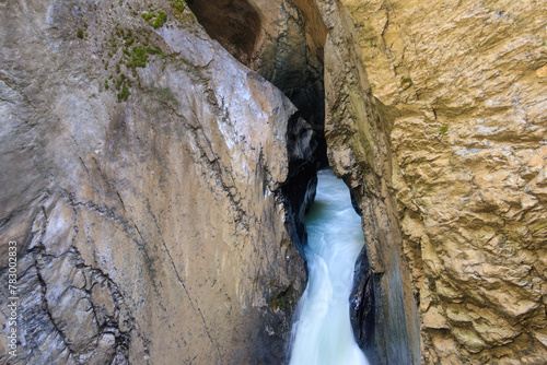 Trummelbach Falls are a series of ten glacier-fed waterfalls inside the mountain in Lauterbrunnen, Switzerland photo