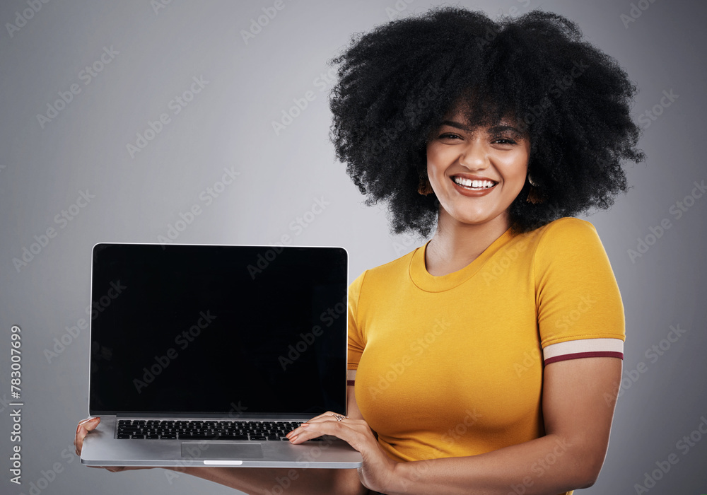African woman, studio and laptop screen for college, presentation or e learning registration and portrait. Student with computer mockup to sign up for online course in marketing on a gray background African woman, studio and laptop screen for college, presentation or e learning registration and portrait. Student with computer mockup to sign up for online course in marketing on a gray background