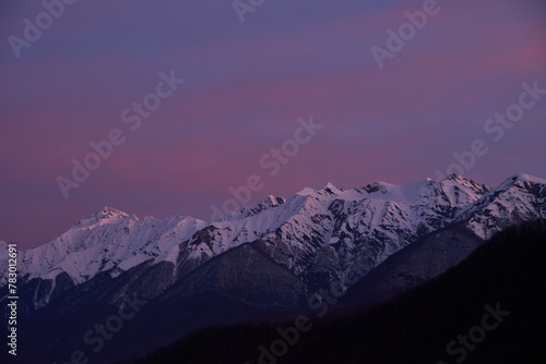 Twilight Majesty: Snowy Peaks and Pink Sky