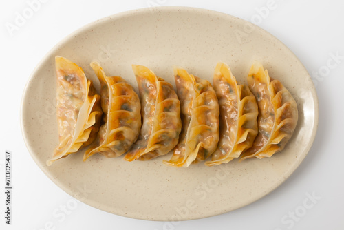 Kimchi dumplings on a white background