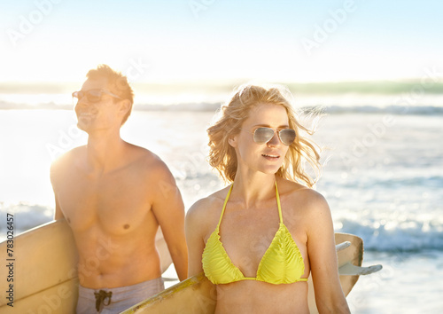 Surfboard, smile or couple at beach walking for adventure, anniversary or sports exercise in Miami, USA. Happy, surfers or people ready for surfing on fun holiday vacation at sea or ocean in summer