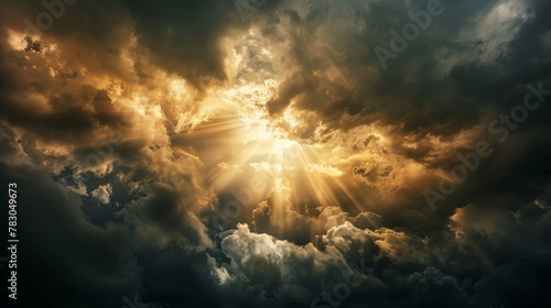 Everlasting hope symbolized in a ray of sunlight breaking through storm clouds © KerXing