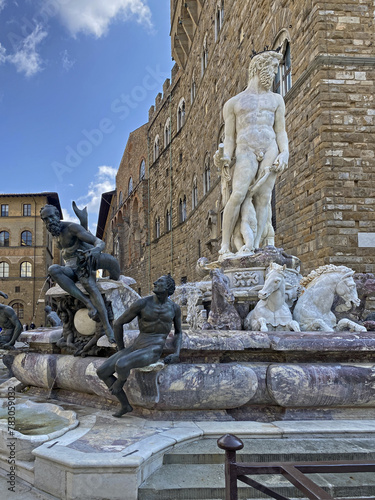 Famous Neptune Fountain on Piazza della Signoria with Palazzo Vecchio in Florence, Italy.