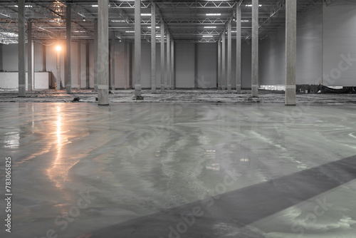 Obraz na płótnie Industrial floor - construction process - screeding and grinding of the concrete floor w salonie