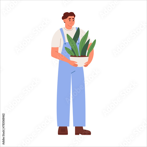 Young man hold plants in pot