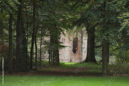 A ruin in a forest at estate De Haere near Deventer, The Netherlands. This ruin is not very old and was build in 1870. A fake ruin is called a folly.
