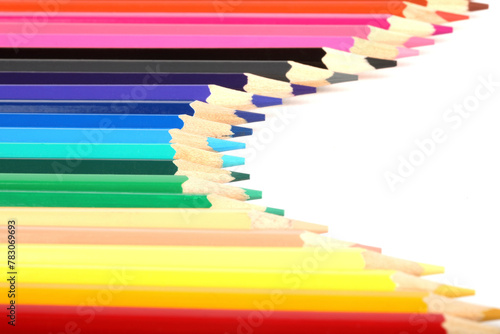 A close-up of colorful crayons isolated on a white background
