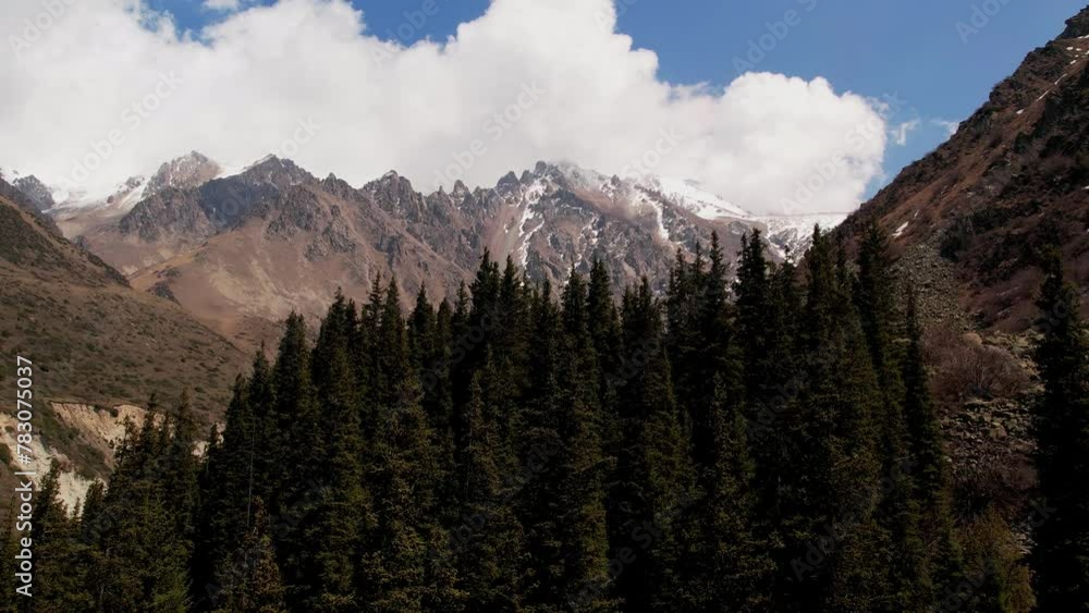 Aerial view of beautiful snowy mountains in Ala Archa National Park, Kyrgyzstan. Beautiful untouched nature Aerial view of beautiful snowy mountains in Ala Archa National Park, Kyrgyzstan. Beautiful untouched nature