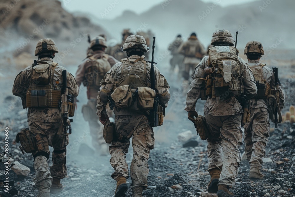 Soldiers marching through rugged terrain in camouflage gear. Soldiers marching through rugged terrain in camouflage gear.