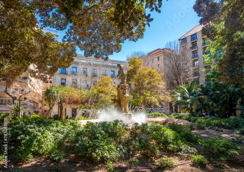 Charming public squares with plenty of shade, subtropical plants and beautiful landscaping dotting the old city center of Alicante, Spain
