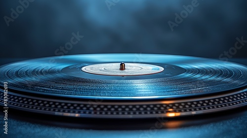 Modern turntable with blue vinyl record isolated on blue background