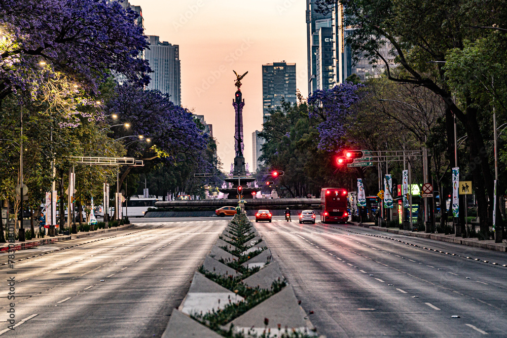 Mexico City, CDMX, Mexico - Sunrise on the Paseo de Reforma looking down at the Angel of Independence   