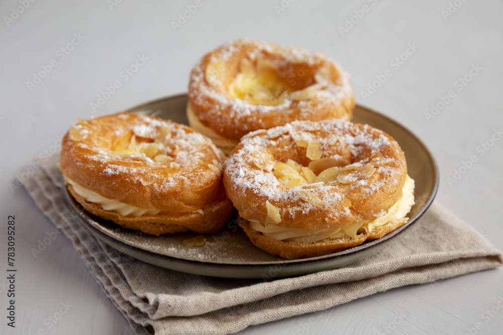 Homemade Paris Brest on a Plate, side view.