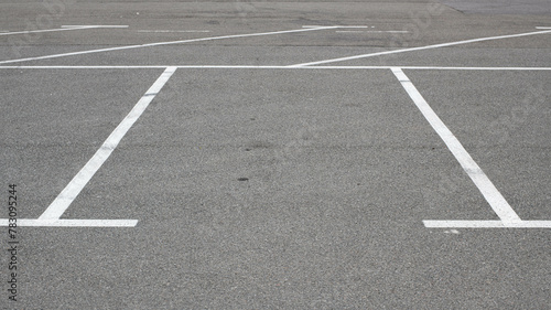 Parking lot markings  black and white stripes. Empty parking place at store