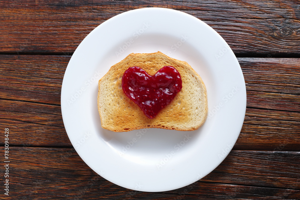 Toast with jam in the shape of a heart Toast with jam in the shape of a heart