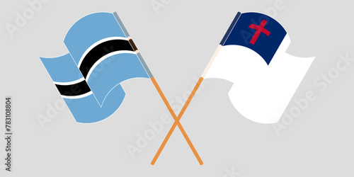 Crossed and waving flags of Botswana and christianity